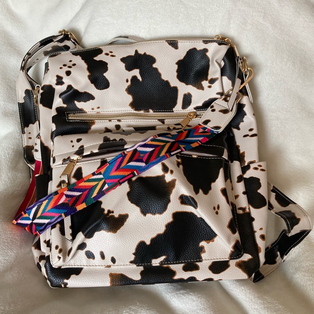 Cow print faux leather backpack